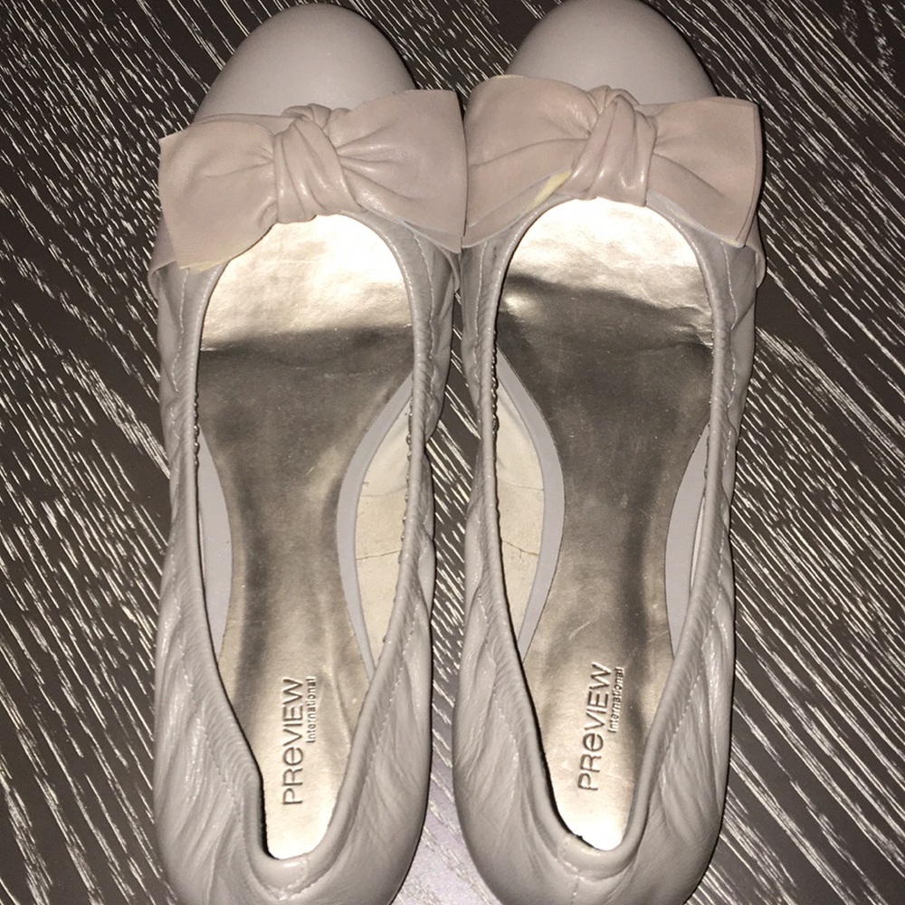 Grey flats with a bow